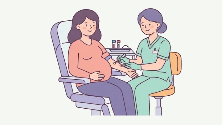 Pregnant woman having a blood sample taken by a nurse